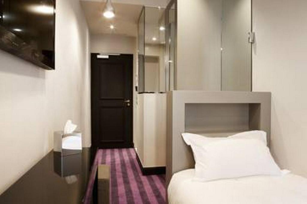 Le Paris Singulier Hotel Quarto foto